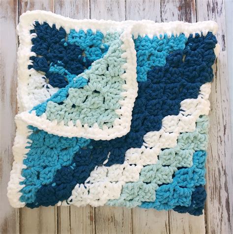 This beautiful and really simple to crochet c2c blanket is a great for a lapghan, but feel free to make it bigger and use it as a bed spread, or smaller and let it be a baby blankie. . C2c crochet baby blanket pattern free